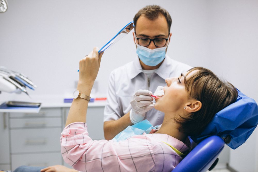 a women is getting dental treatment